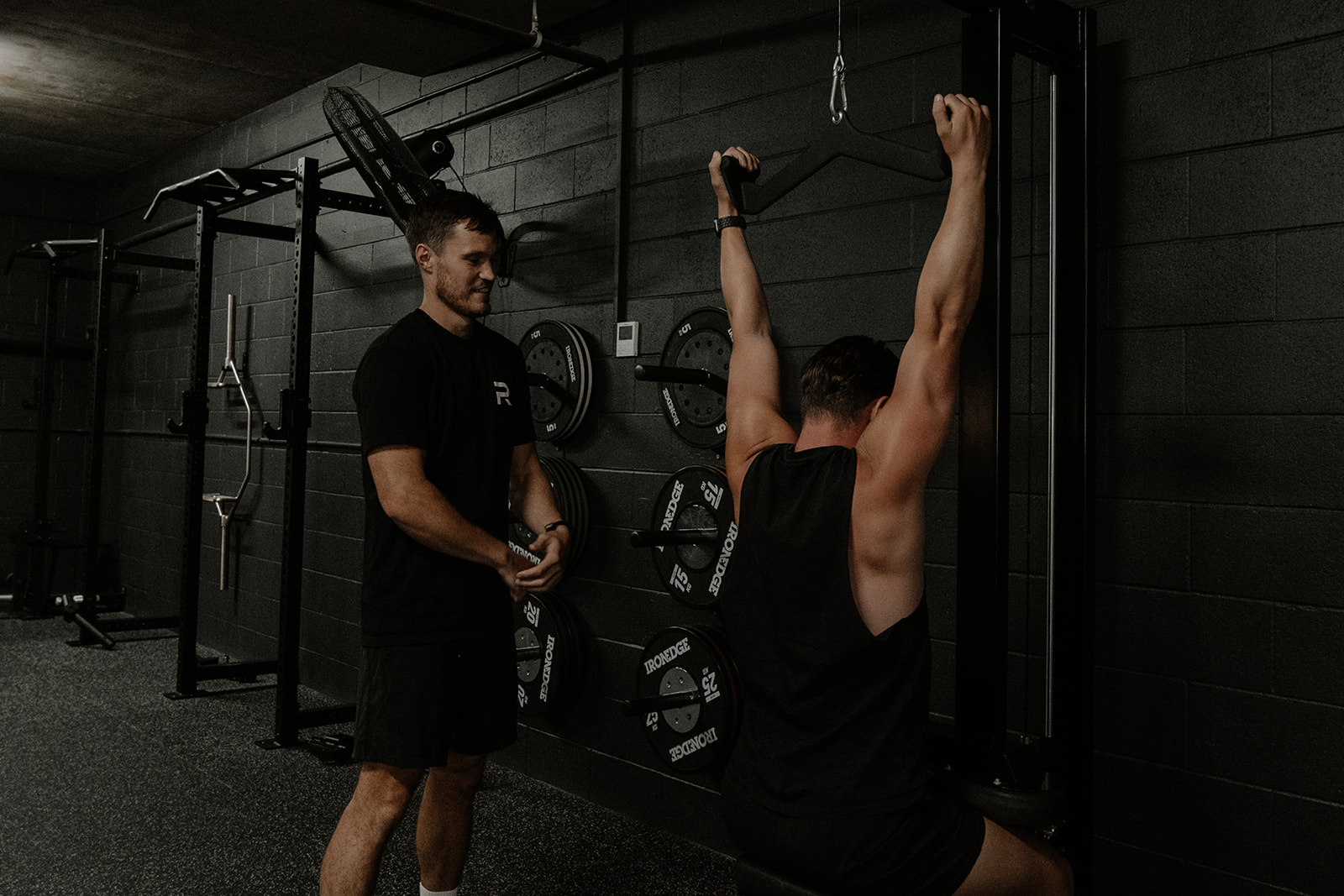 Female personal trainer with client near in Mermaid Beach QLD